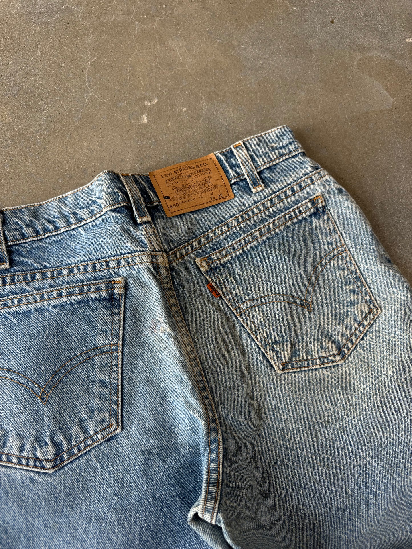 Vintage 1990s Levis 550 Relaxed Fit Orange Tab Jeans [28]
