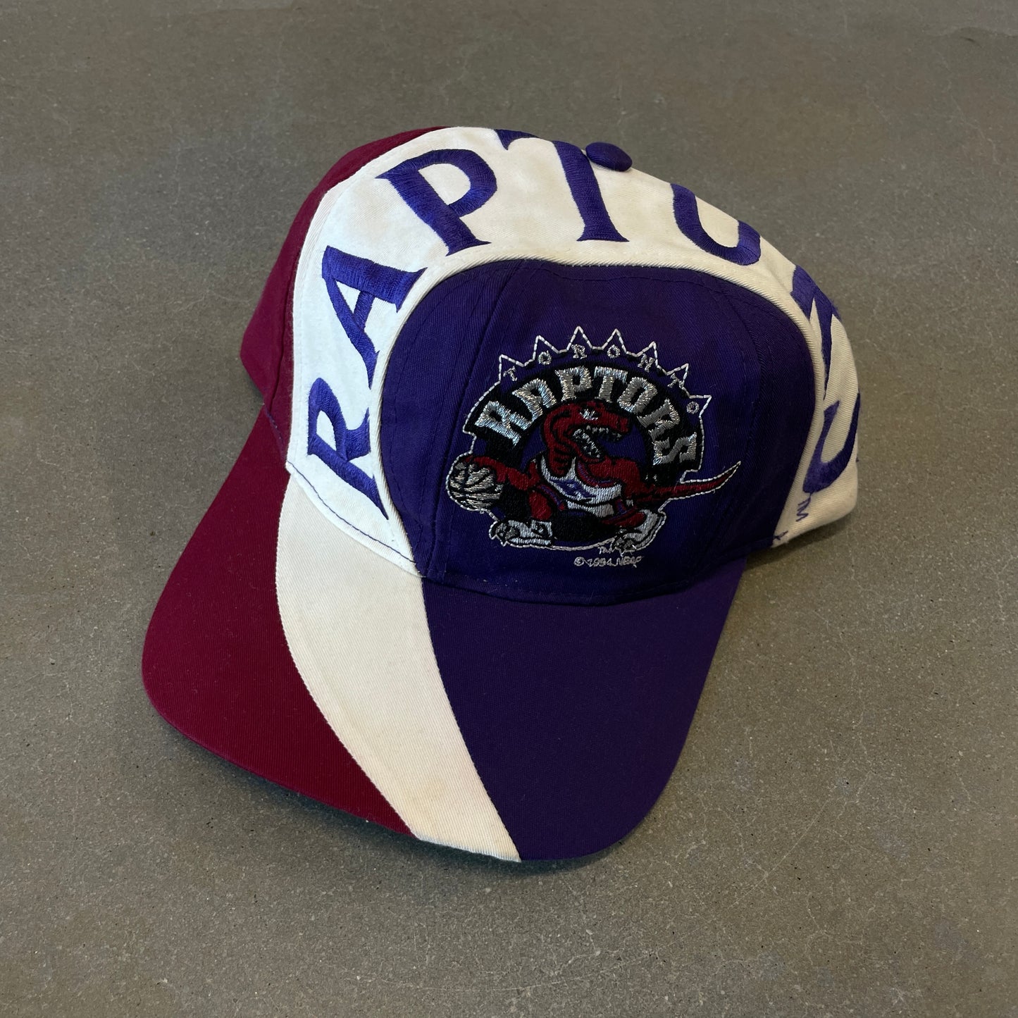 Vintage 1990s Toronto Raptos Swirl Snapback Hat