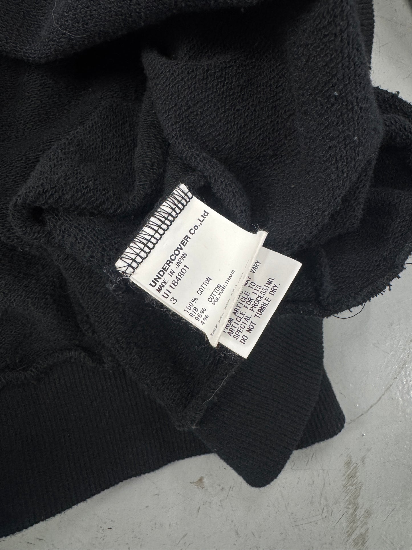 SS22 Undercover Rebelgods Hybrid Sweater